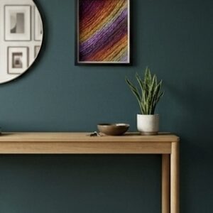 image of colorful fingerknitted artwork in a modern entry way.